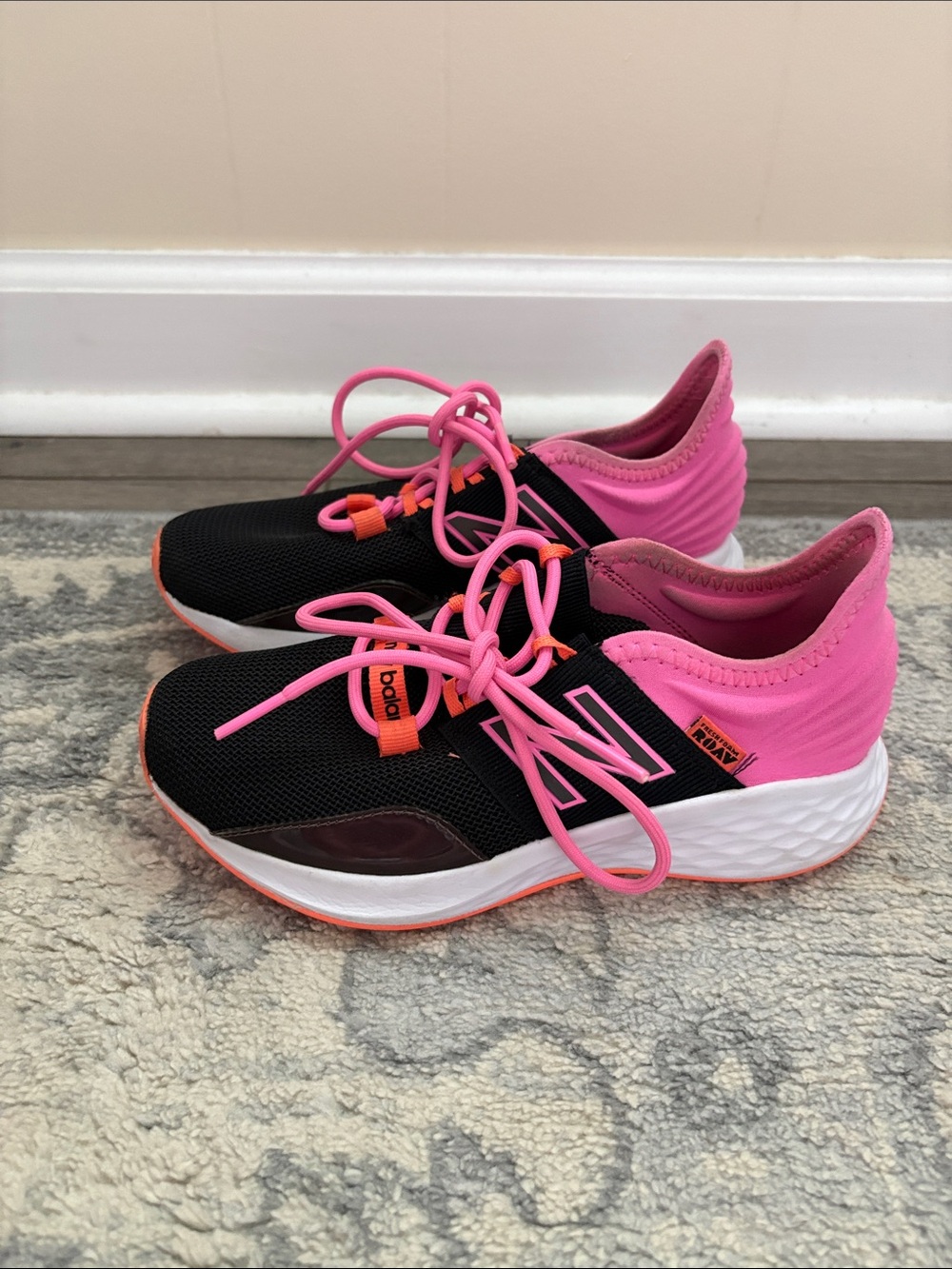 New Balance Black and Hot Pink Performance Sneakers